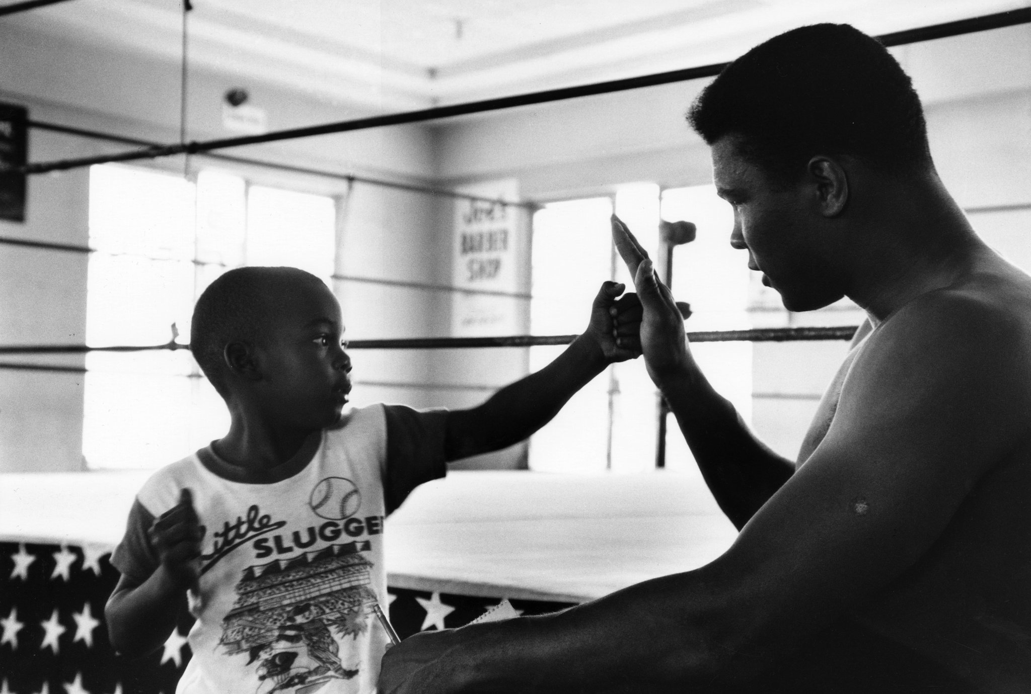   Muhammad Ali with a young fan. Miami. 1966.  CreditGordon Parks, courtesy of The Gordon Parks Foundation
