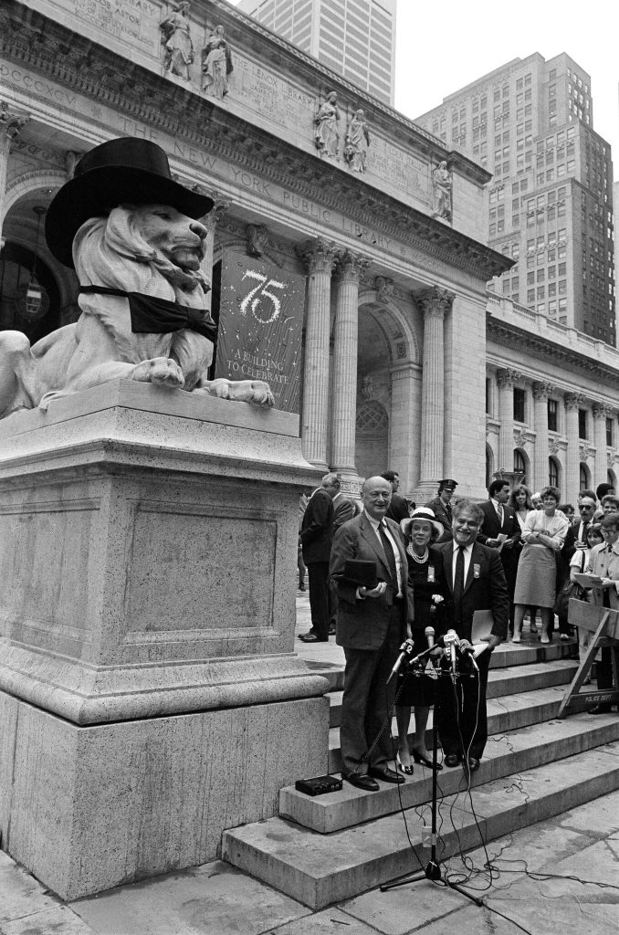 Dr. Gregorian joined Brooke Astor and Mayor Edward I. Koch for a news conference in 1986 on the steps of the library’s flagship building on Fifth Avenue and 42nd Street in Manhattan.Credit...Jim Wilson/The New York Times