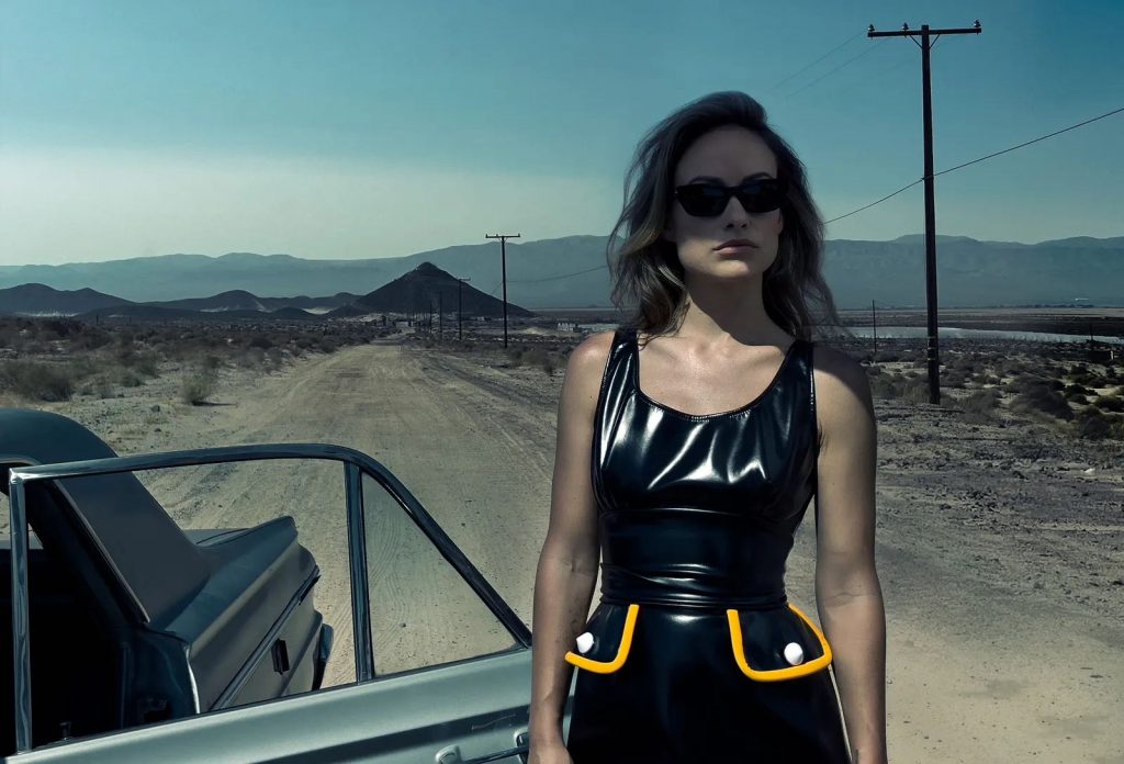 Olivia Wilde, in a Louis Vuitton dress and Celine sunglasses, photograph by Annie Leibowitz. Courtesy of Vogue.